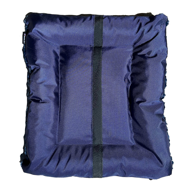 Bottom of blue rectangle dog bed with a black strip