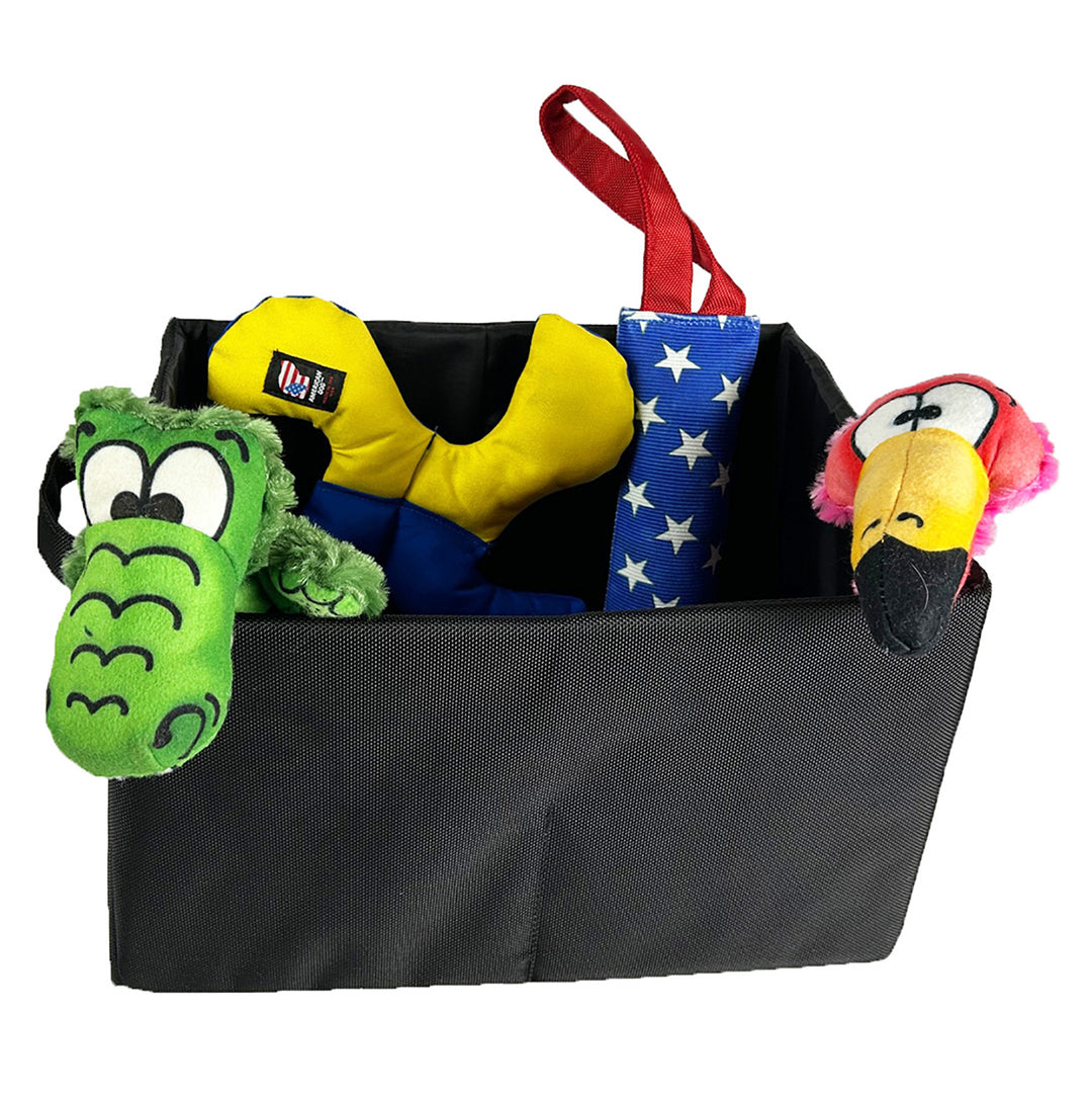 Black toy box with Flora, Lucky Dog star, Fireshose, and Aligator do toys