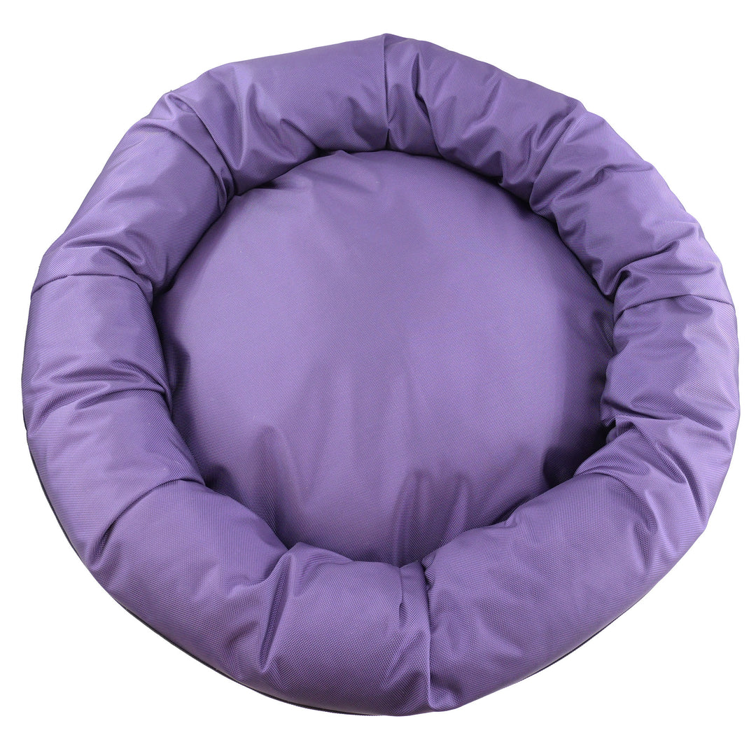 Top view of a purple round bolstered dog bed.