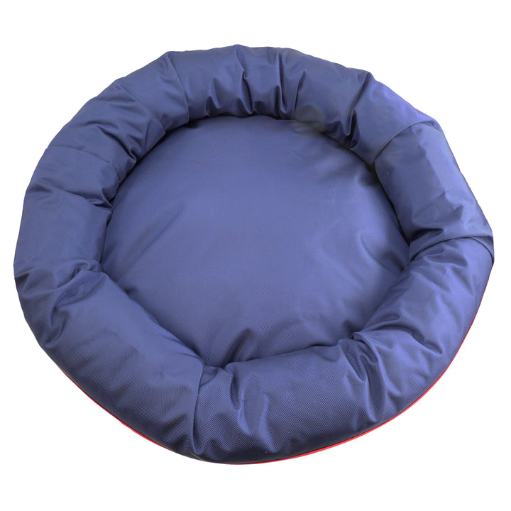 Top view of navy round bolstered dog bed.