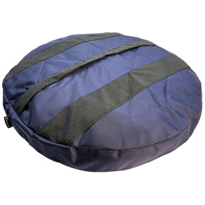 Round navy colored dog bed bottom with grip strips