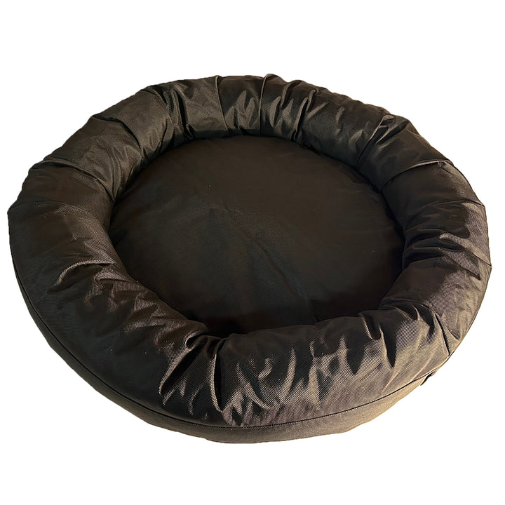 Round black bolster bed top view