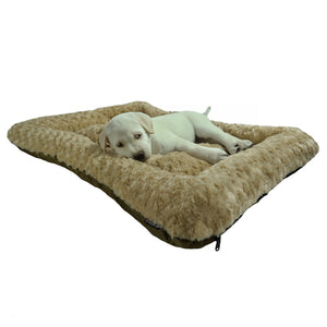 Camel colored bolstered rectangle fleece dog bed with a white Labrador puppy lying on it.