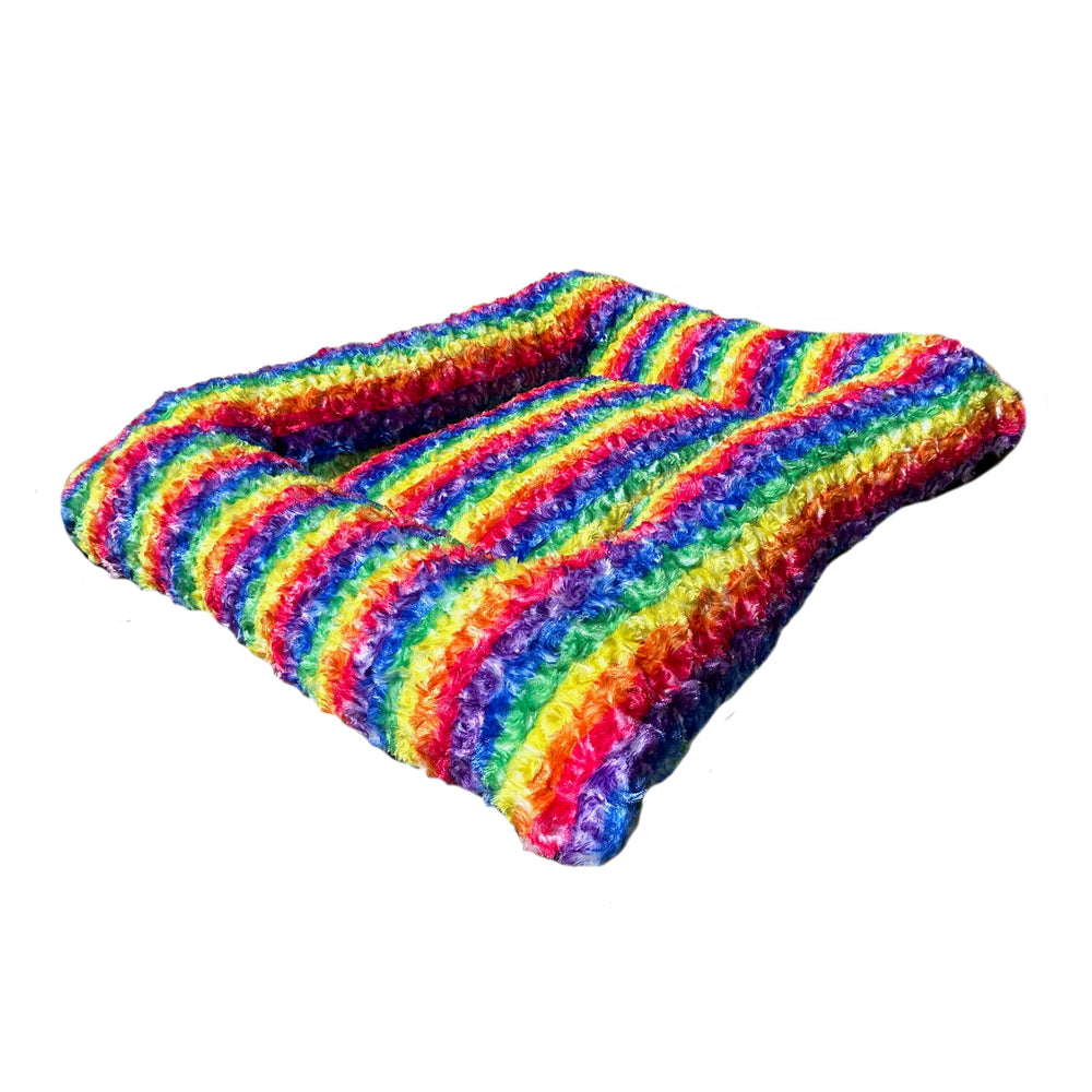 Rainbow striped fleece dog bed.  rectangle shape with side bolsters