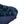 close up of dark blued fleece bolstered round dog bed 