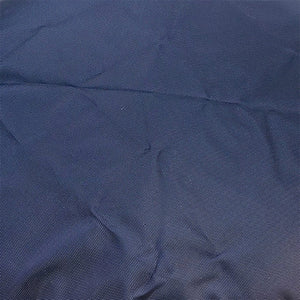 Close up of dark blue colored fabric