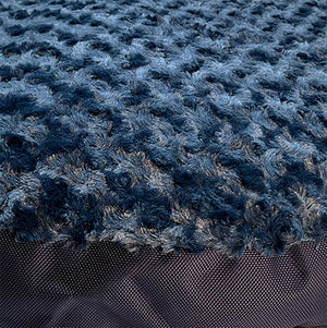 Dark blue swirly fleece close up