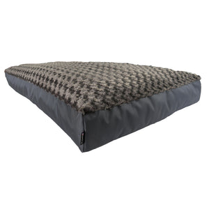 charcoal colored dog bed with swirly fleece top