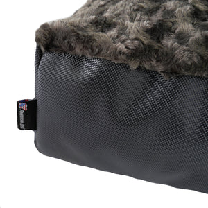 close up of textured charcoal colored fabric and American Dog label