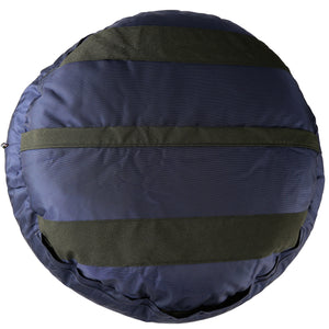bottom of dark blue round dog bed with black strips