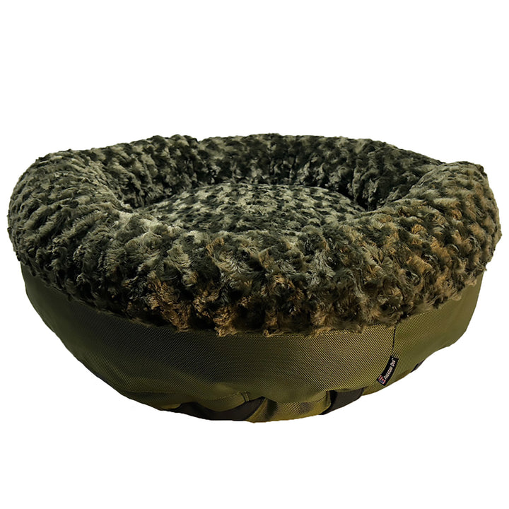 an olive colored round bolstered dog bed with a white background