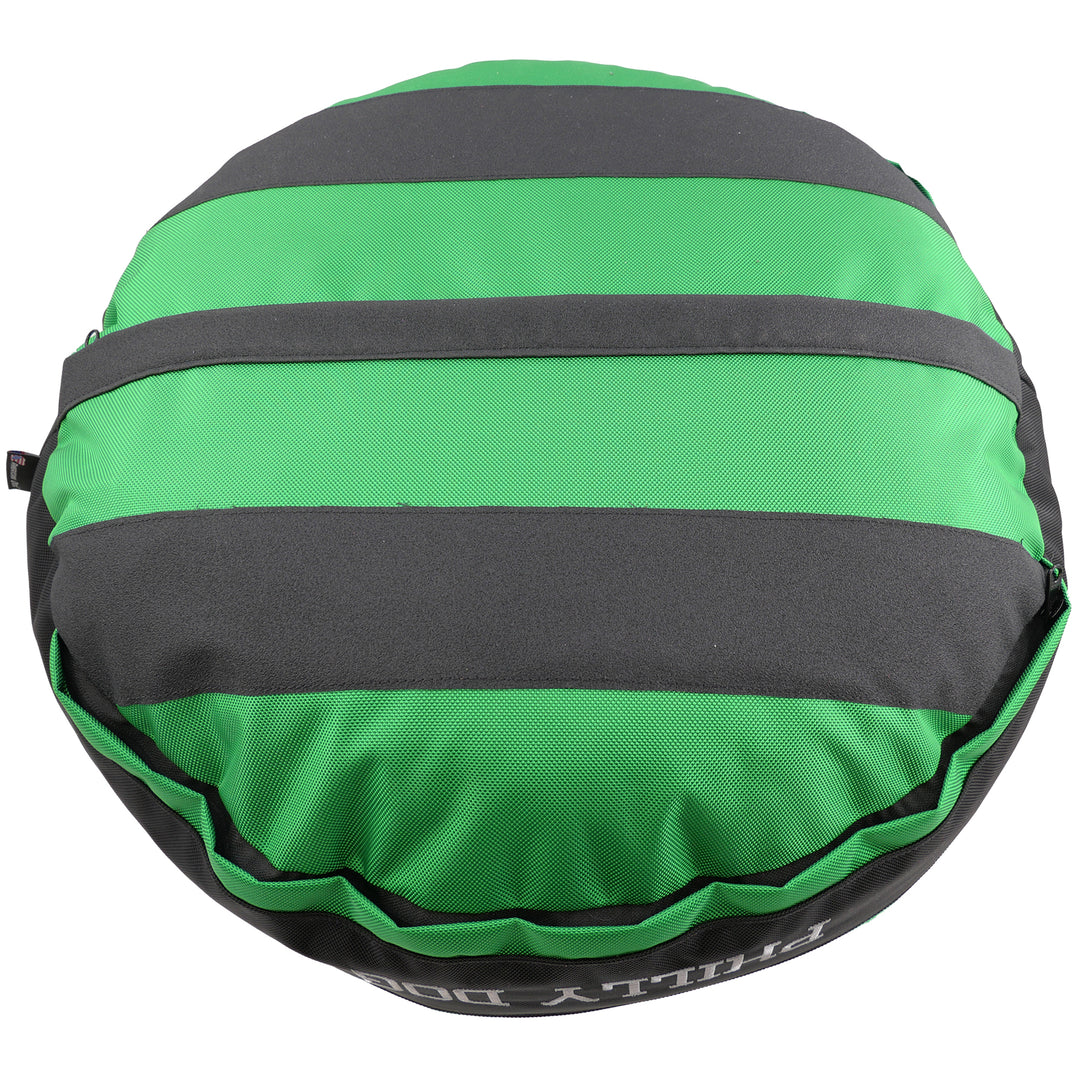 Bottom of green round bolstered dog bed with black strips and black band.