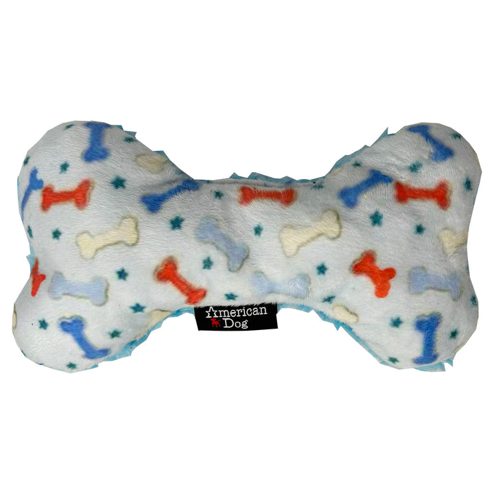Bone-shaped dog toy with colorful fleece bone pattern & blue stars on a white soft fleece background, branded 'American Dog'.