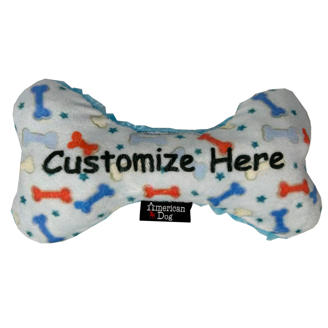 Bone-shaped dog toy with colorful fleece bone pattern & blue stars  branded 'American Dog'. And text saying Customize Here' in the center