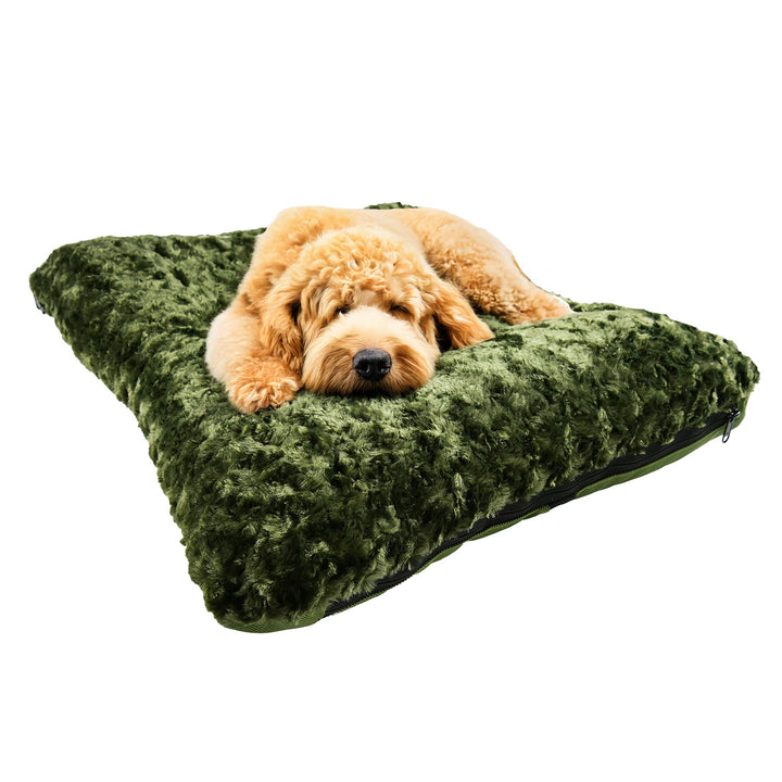 Dog lying on a bolstered rectangle olive colored fleece dog bed