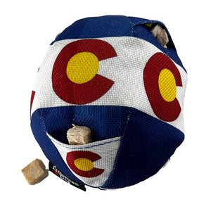 round  blue with a ball with a white band.  Red c's  with a yellow center and little treat pockets with dog treats in  them