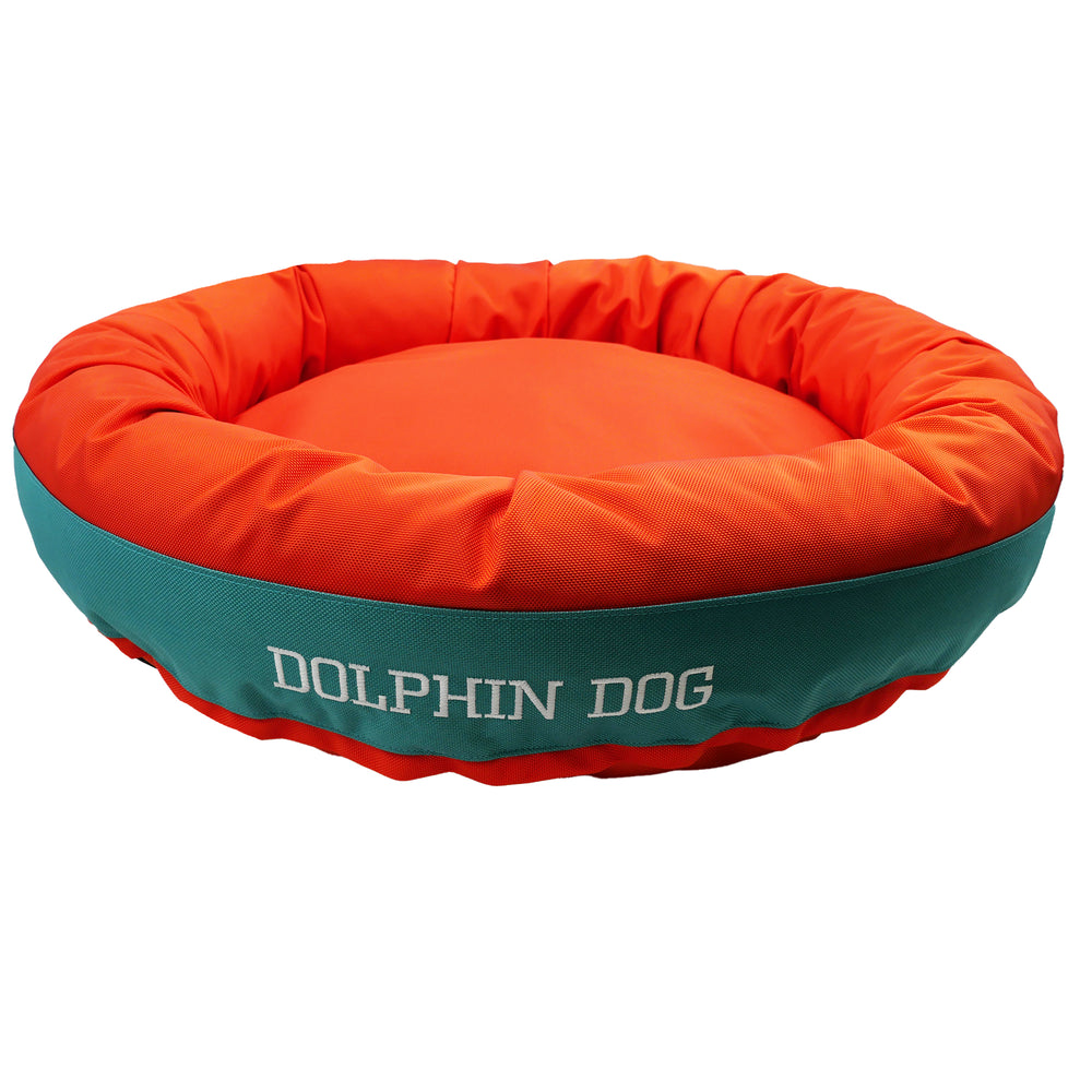 orange & teal round bolster bed with words dolphin dog