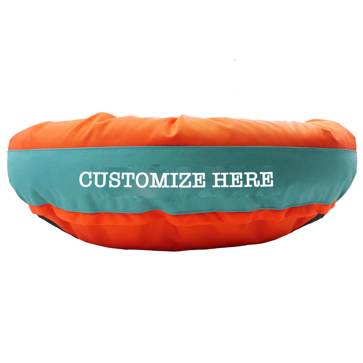 orange & teal round bolster bed with 'customize here' area