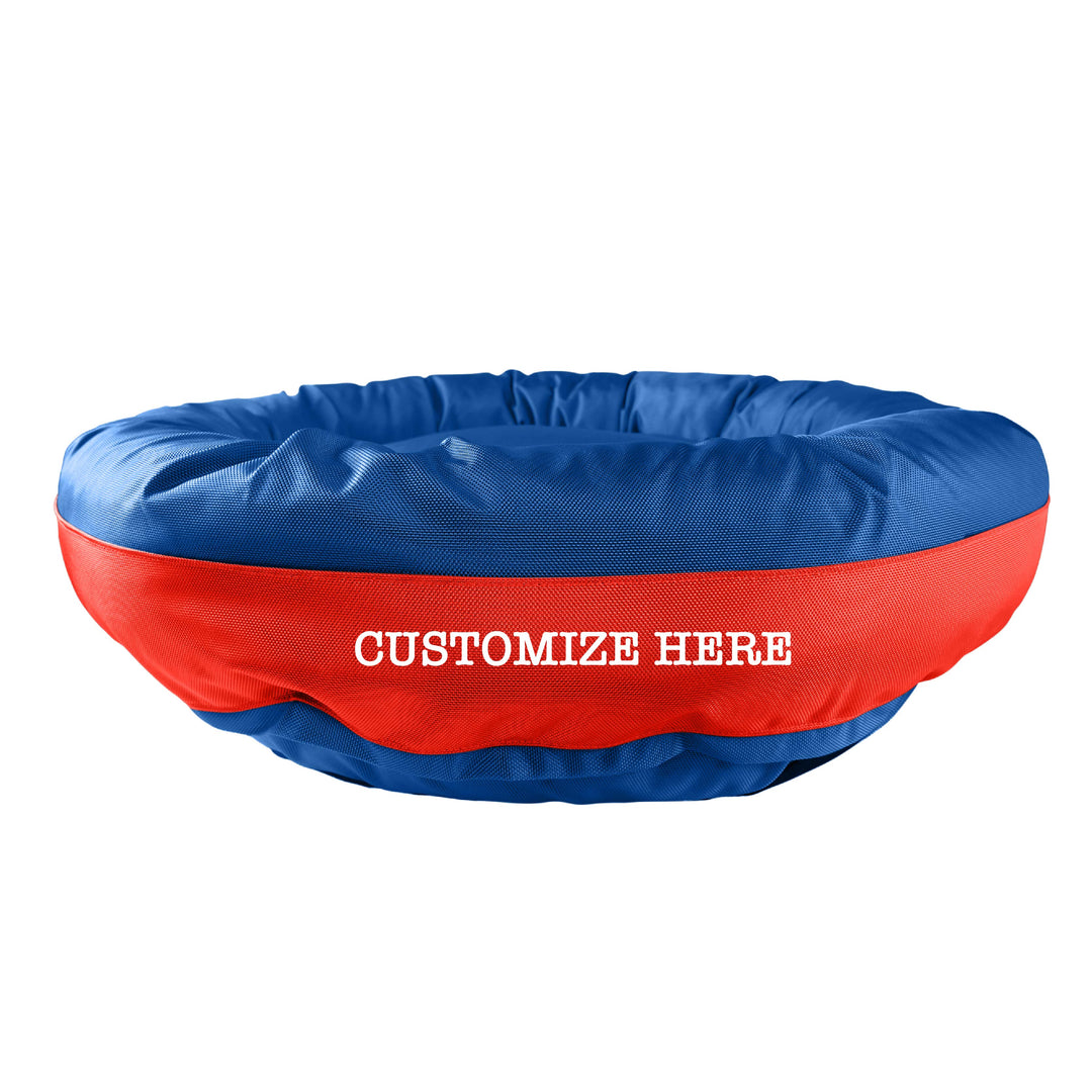 Royal round bolstered dog bed with a red band with white embroidered 'Customize Here'.