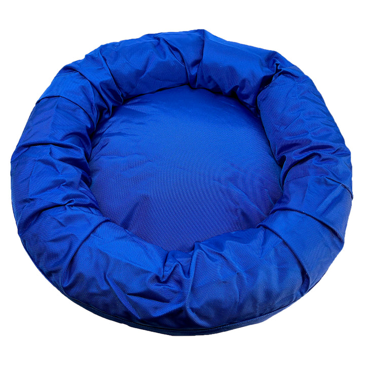 Top view blue bolstered dog bed .