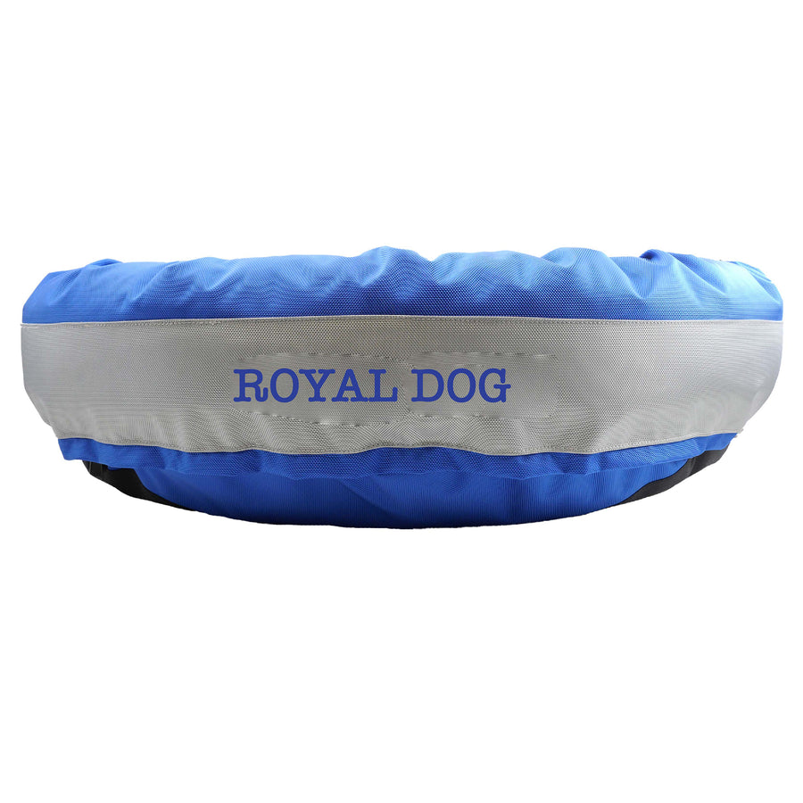 Royal round bolstered dog bed with silver band and royal embroidered "royal Dog'.