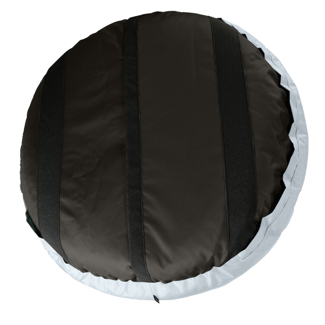 Bottom view of round dog bed.  All black with black fabric strips
