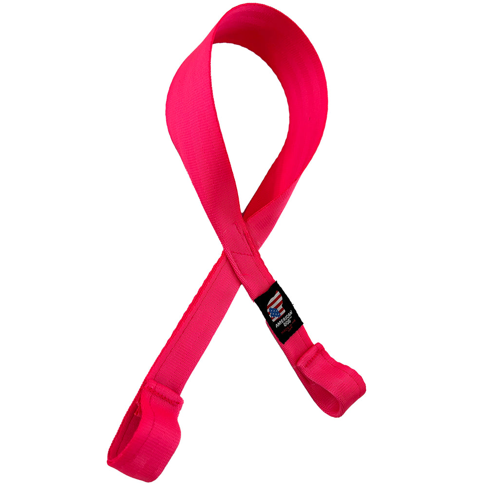 Pink seat belt crossed in the middle to create cancer awareness tuggable toy