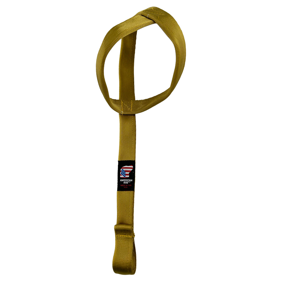 Gold seat belt with a long handle and double loop at end.
