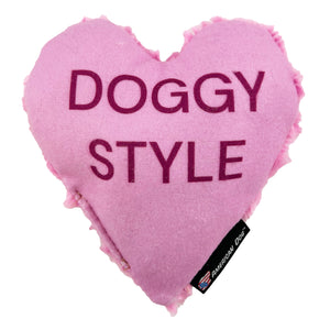 Pink heart shaped dog toy with Doggy Style' on it