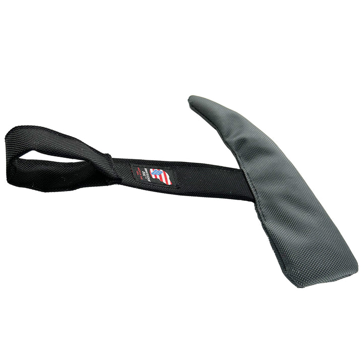 Hammer shaped dog toy.  Head is gray and the handle is black with a loop