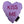 Purple heart shaped dog toy with 'Kiss Me' on it