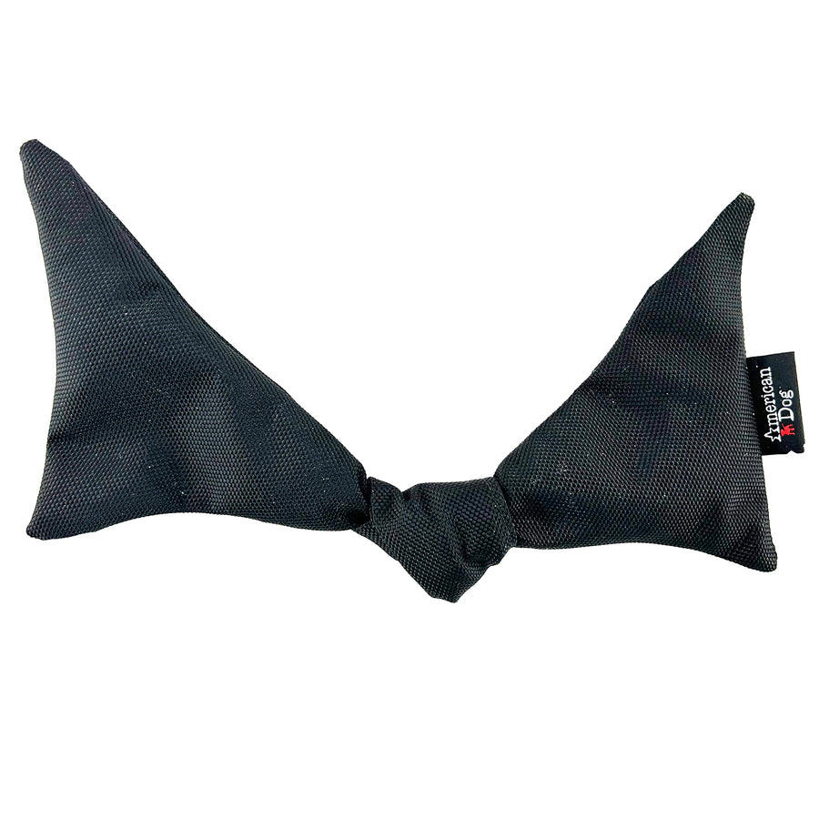 black bat shaped dog toy with a knot in the middle