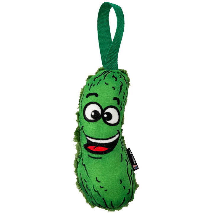 Green pickle shaped dog toy with a cartoon smiley face and green tug handle