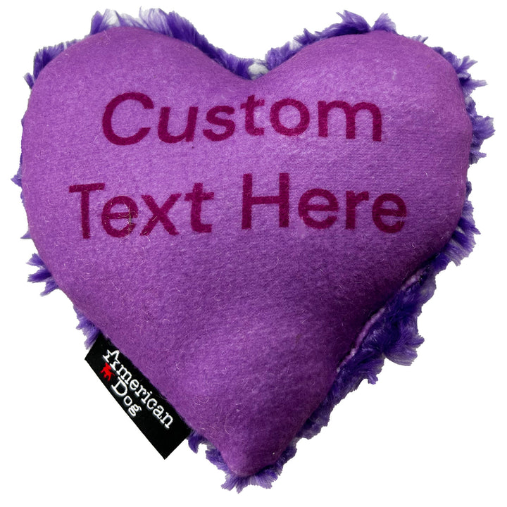 Purple heart-shaped dog toy with customizable text and American Dog branding.