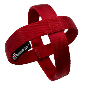 Red seatbelt with two loops to create a ball shaped dog toy