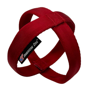 Red seatbelt with two loops to create a ball shaped dog toy