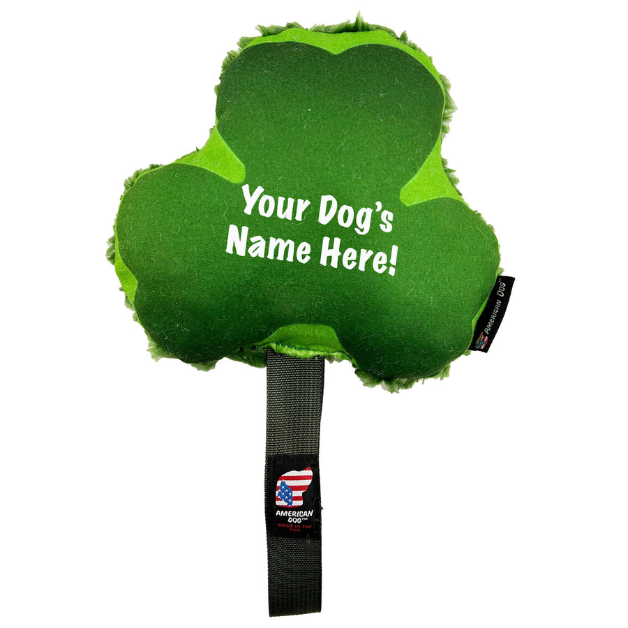 Green fleece in the shape of a Shamrock and with a green handle.  Words 'Your Dog's Name Here'