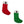 Red & green stocking shaped dog toys with white at the top