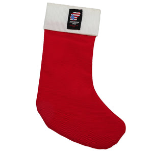 Red  stocking shaped dog toy with white at the top