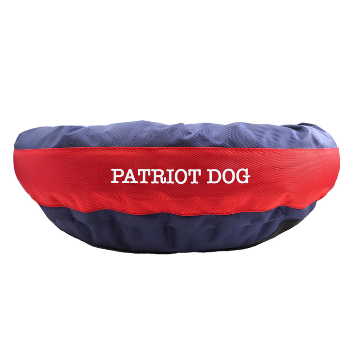 Blue and red dog bed side view with embroidered 'patriot dog'