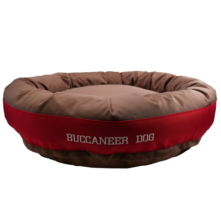 Round bolstered Brown and red dog bed with Buccaneer Dog embroidered in white