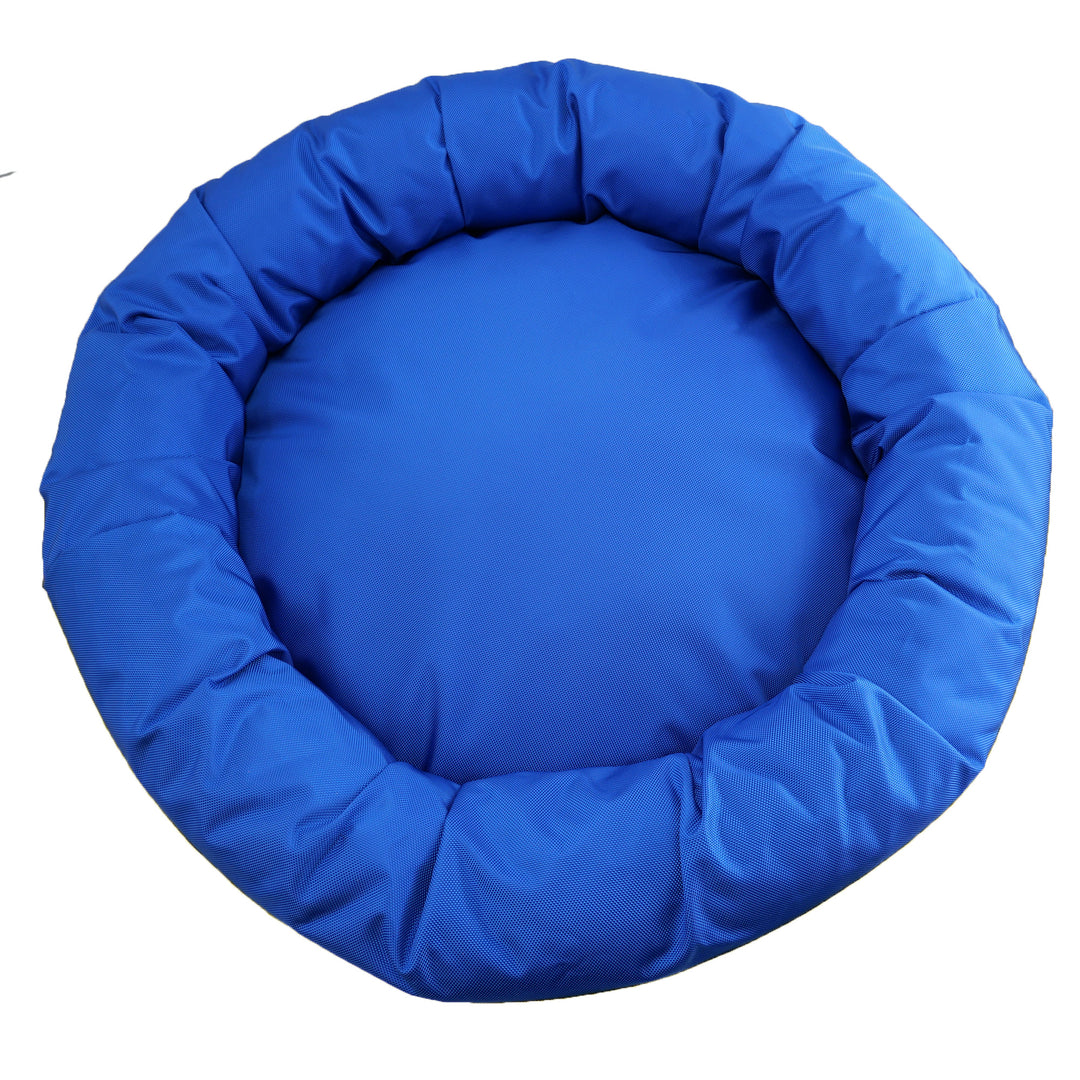 Round bolstered blue dog bed top view