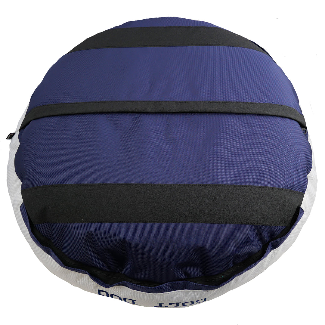 Bottom view of Dark blue and white dog bed with black strips