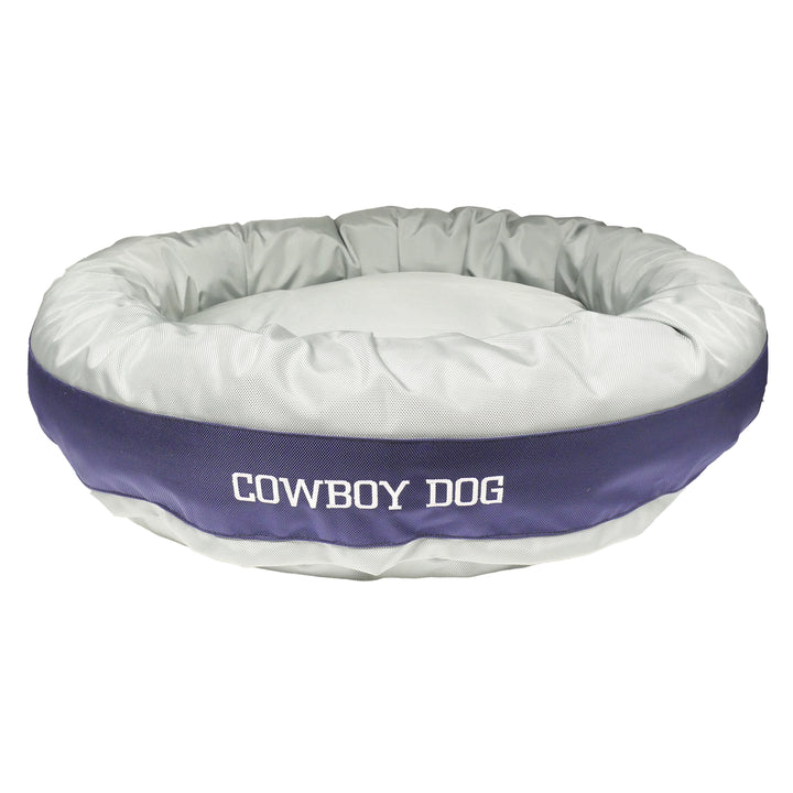 Silver and Blue round bolstered dog bed with' cowboy dog' embroidered