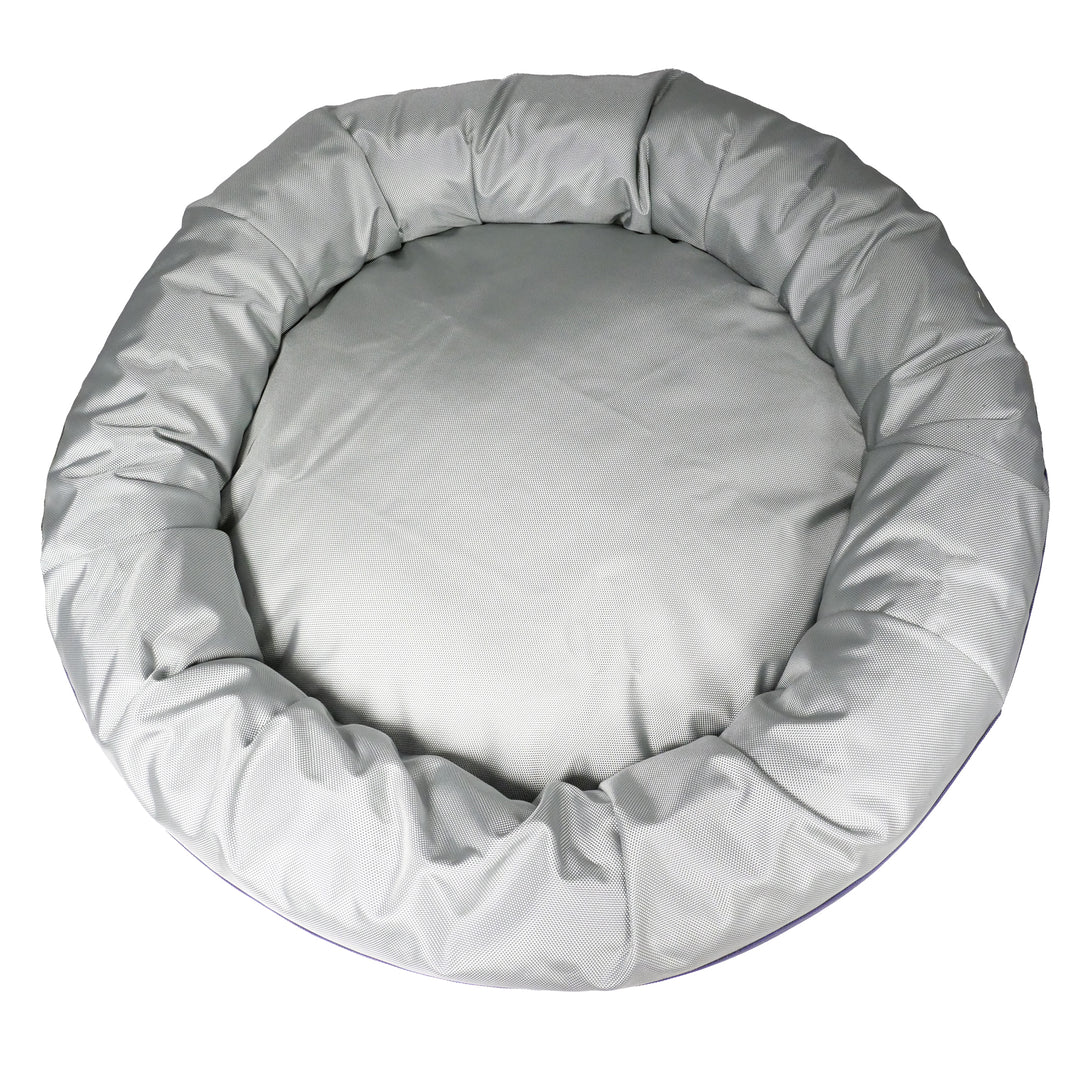 Top view of round bolstered silver dog bed