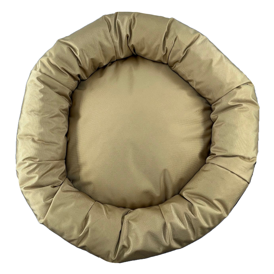 Top view of gold round bolstered dog bed.