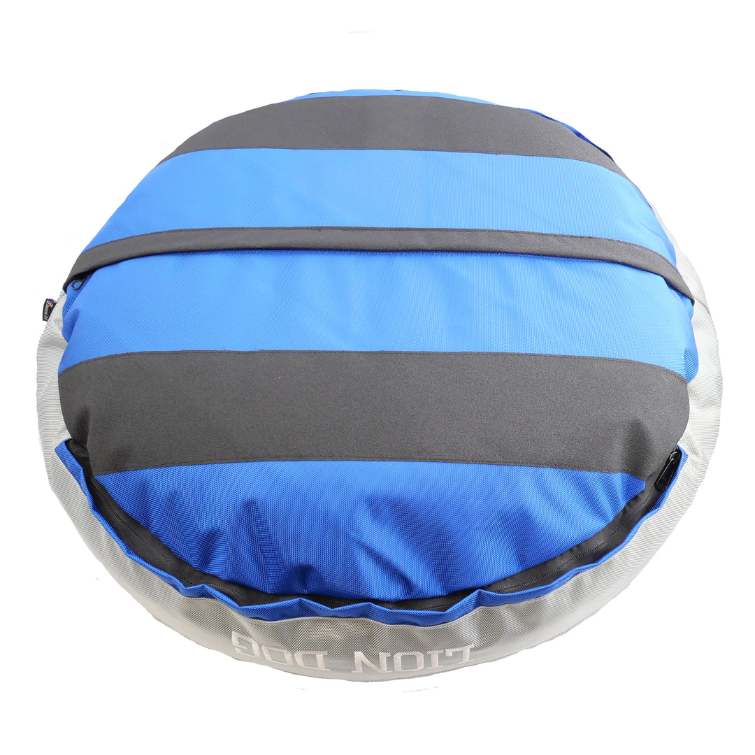 Bottom view of round dog bed.  Blue with black stripes
