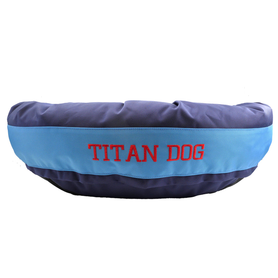 Blue and light blue dog bed with embroidered Titan Dog in red