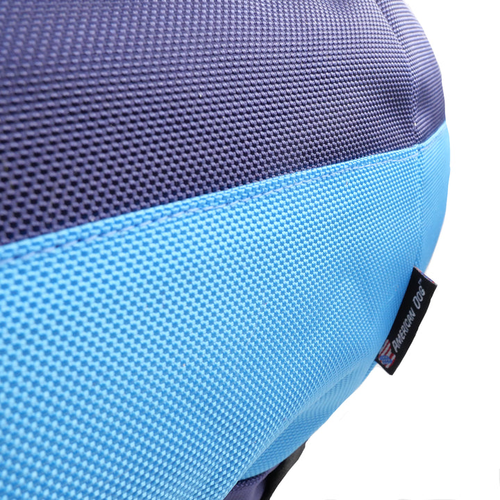 close up view of blue and light blue dog bed