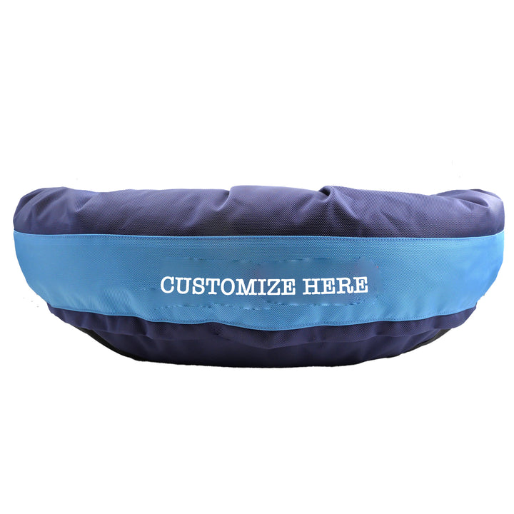 blue and light blue dog bed with 'customize' area